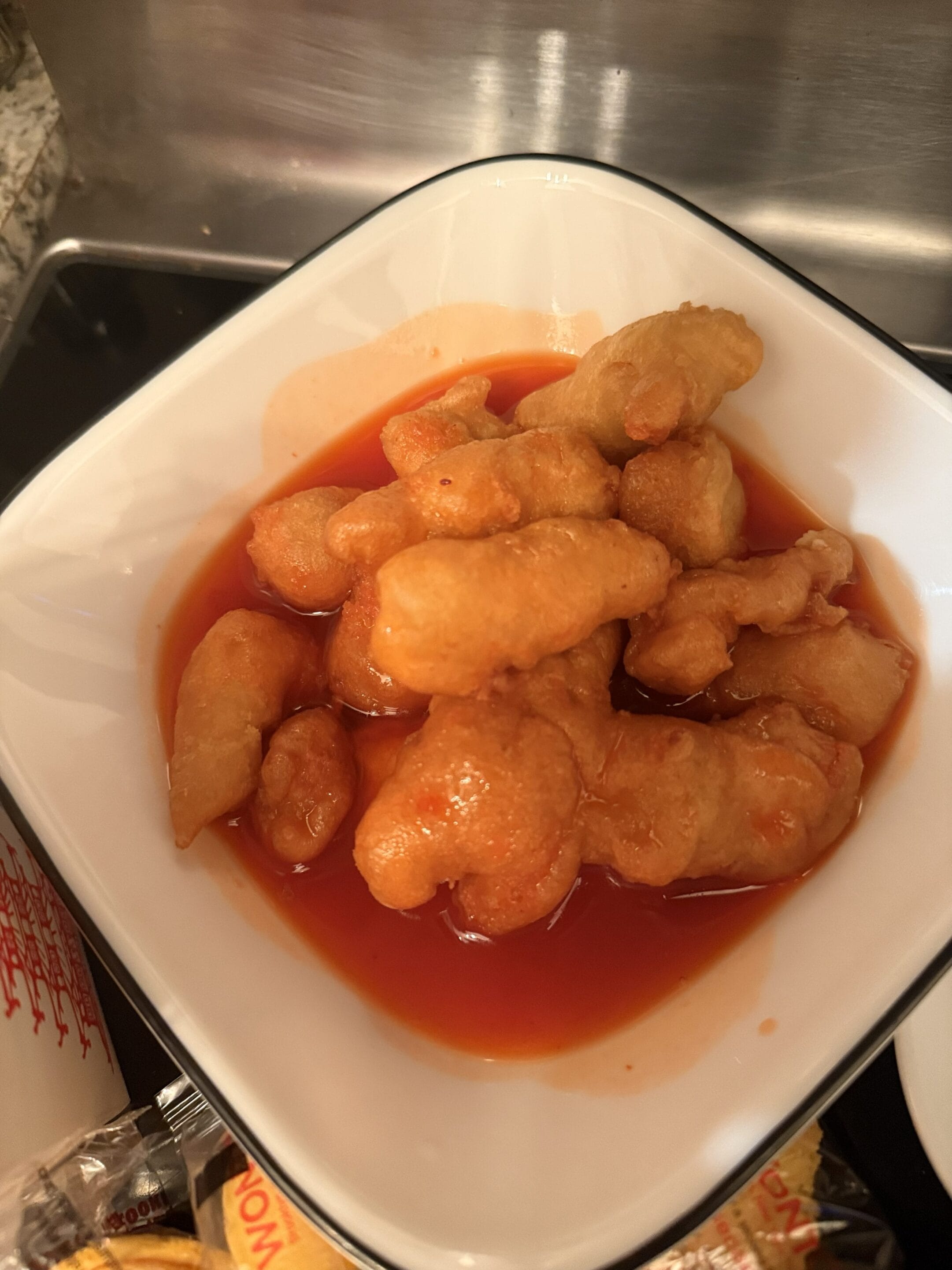 China Garden crab rangoons arranged on a plate, golden and crispy, ready to serve.