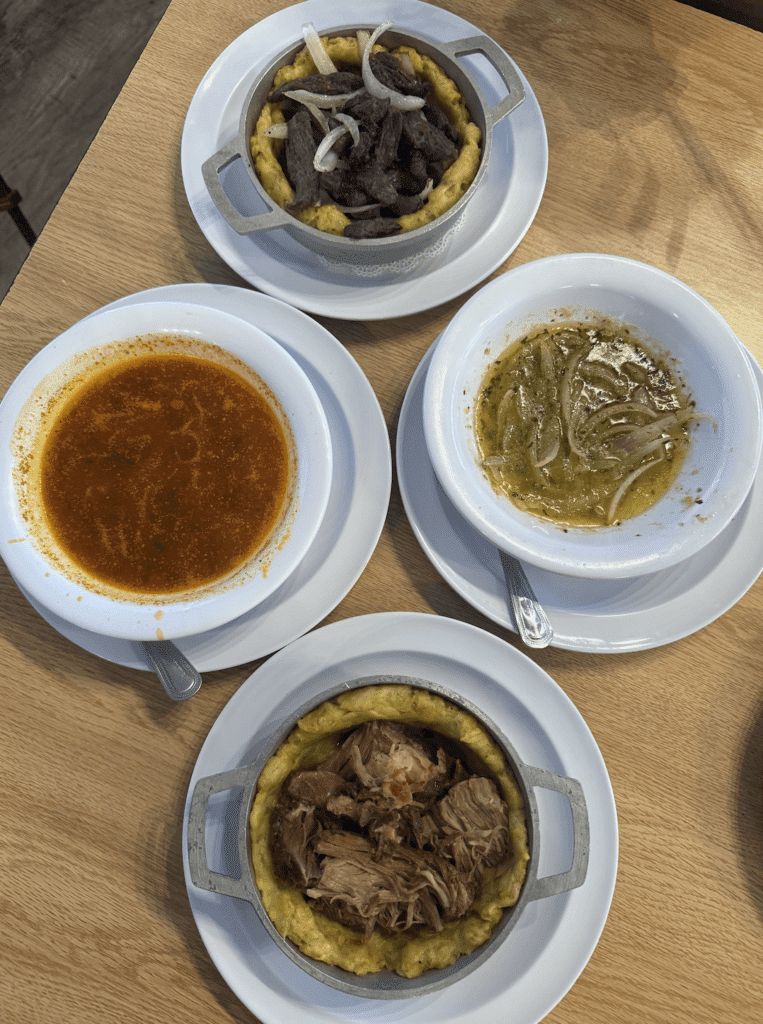 Pernil and Churrasco mofongo with garlicky mashed plantains, topped with slow-roasted pork shoulder and grilled skirt steak, a classic Puerto Rican cuisine comfort dish