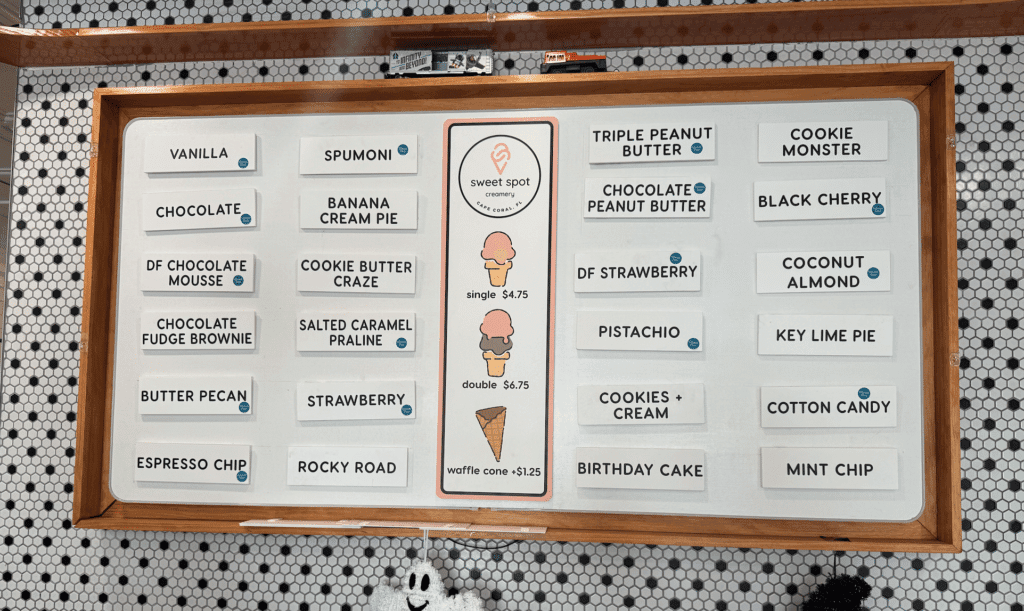 Board displaying a variety of ice cream flavors at Sweet Spot in Cape Coral.