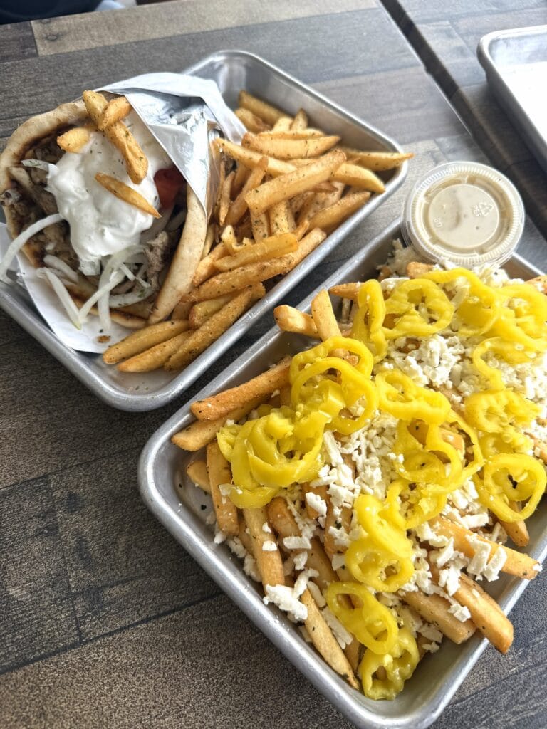 Authentic Greek food platter with fresh ingredients and traditional dishes at The Greek Spot.