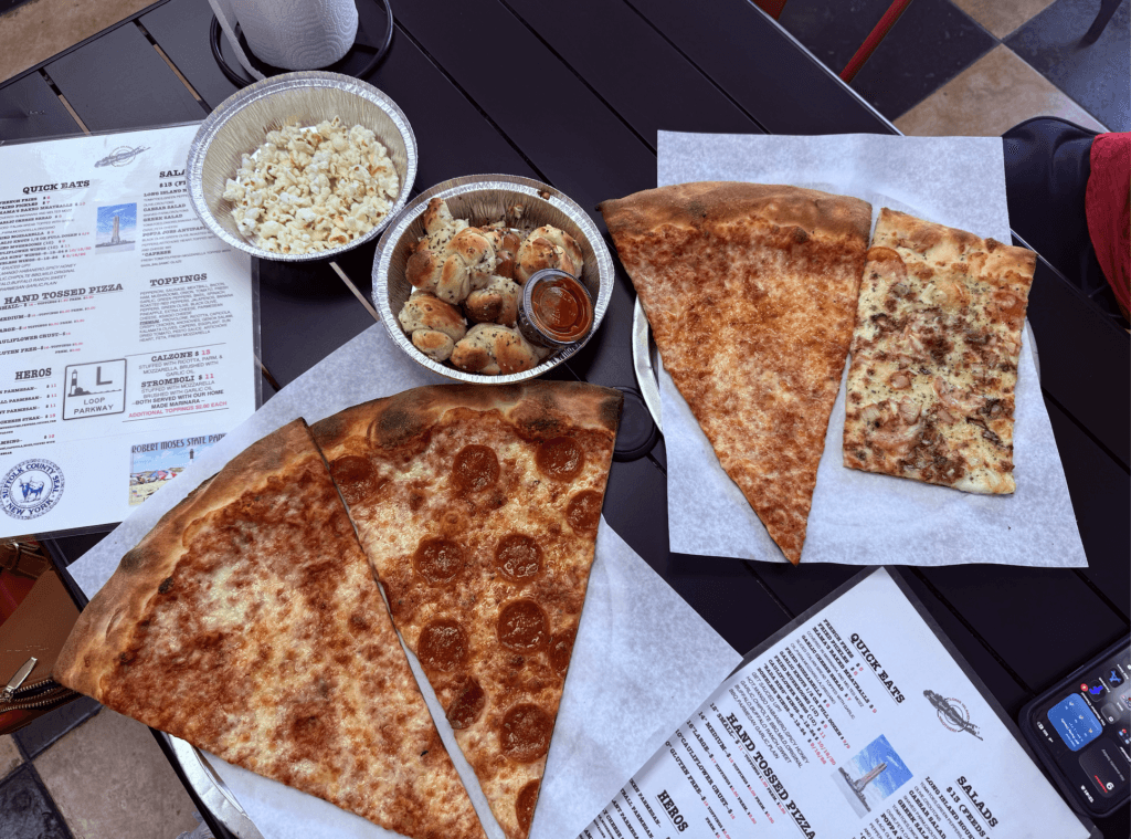Fresh garlic bread and handcrafted pizza at Long Island Brother’s Pizza.