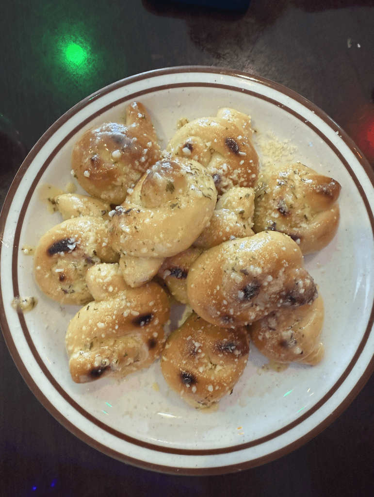 Garlic knots with butter and herbs served at Sicily Trattoria in Cape Coral.