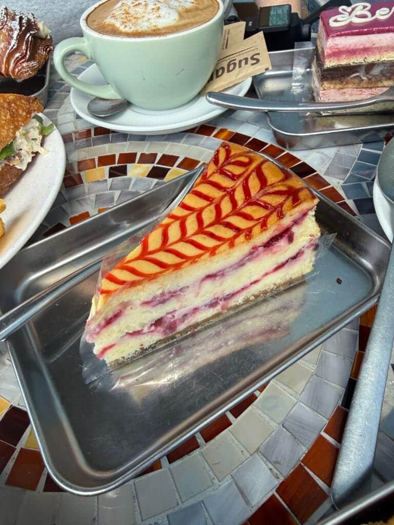 Layered strawberry and cream cake slice from Amore Italian Market And Bakery in Cape Coral.
